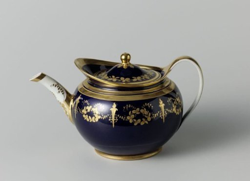 Teapot with foliate scrolls and torches