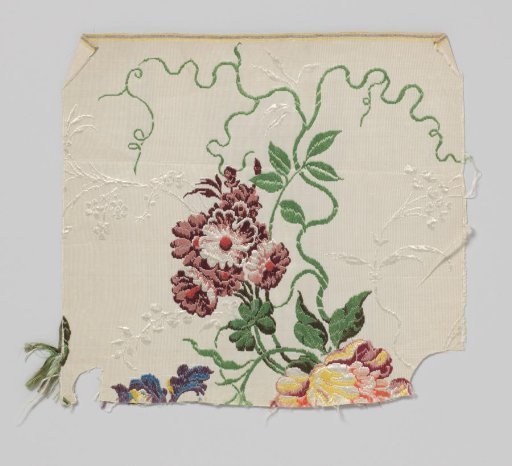 Fragment of silk with a pattern of branches with a bouquet in red on a white ground, on a Gros de Tours background