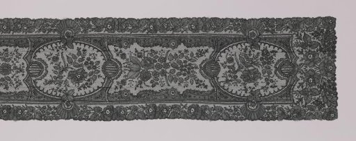 Stola of black bobbin lace with four oval medallions within a rectangular border