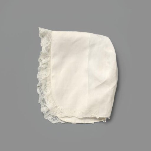 Child's cap of linen and Mechlin lace; marked: S