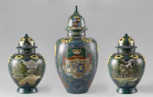 Three lidded earthenware vases