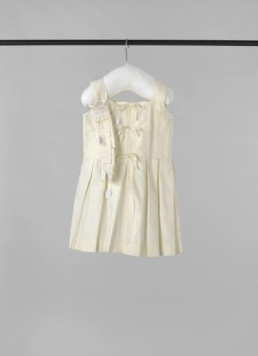Fragment of white cotton with woven stripe
