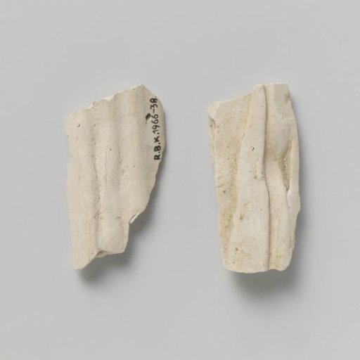 Figurine, Two Fragments of the Garment