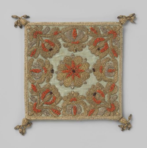 Purse with gold thread embroidery, with blood coral on a gold rosette on the front