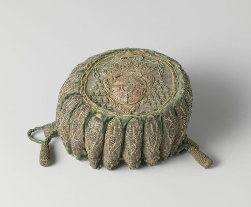 Chasuble of green velvet with a lining of silver brocade, on which a cardinal's coat of arms is embroidered in relief with gold thread and colored silk