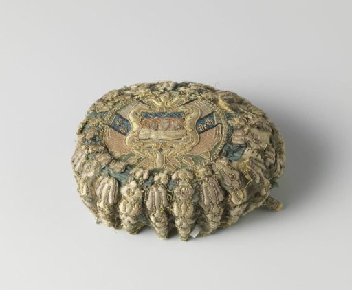 Playing card case probably originally of green velvet, embroidered in gold, silver thread and multicoloured silk with the city coat of arms of Paris