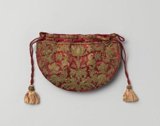 Semi-circular, flat pouch of cerise red satin embroidered with a symmetrical flower and leaf motif in gold thread, with drawstring and silk tassels