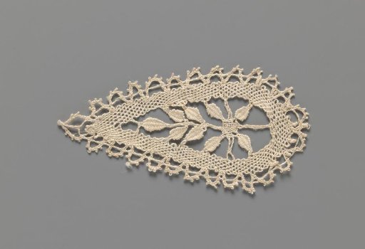 Motif of bobbin lace in the shape of a drop