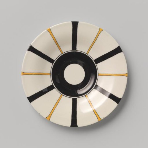 Plate with radial linear decoration in yellow and black on a cream ground