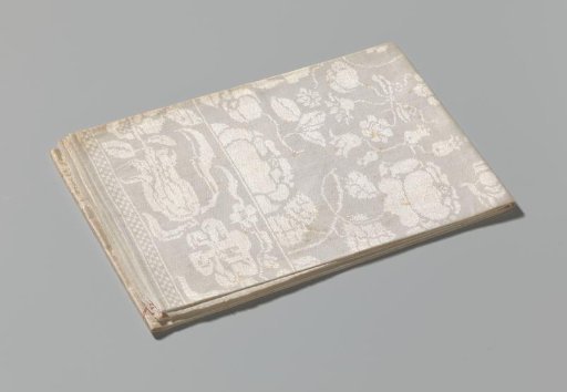 Linen damask napkin with a floral pattern