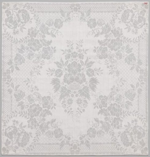 Linen damask napkin with a lace pattern