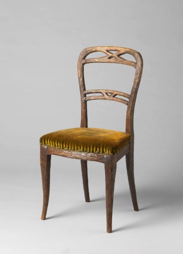 Chair and cabriolet, upholstered in green morocco leather