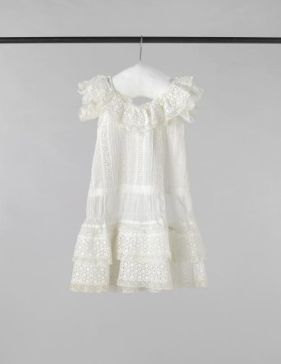A summer dress for a little girl, of batiste and English embroidery strips