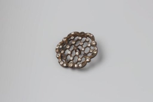 Button of copper with paste