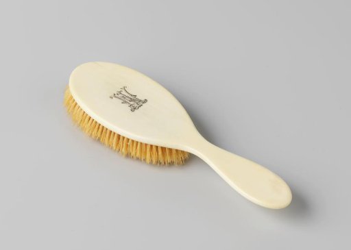 Ivory hairbrush with monogram JVN