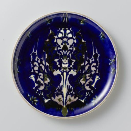 Wall plaque with a three-part symmetrical vegetative ornament