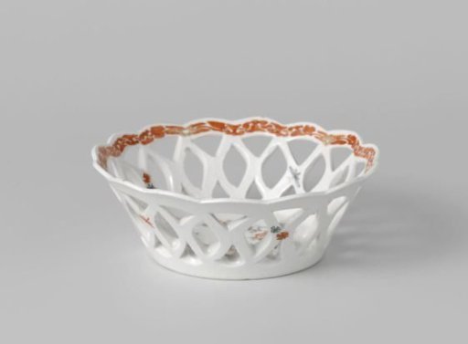Bowl with quails near flowering plants
