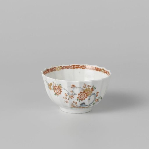 Cup with quails near flowering plants