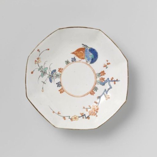 Saucer with quail and flowering plants