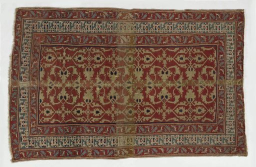 Four Joined Fragments of an Oriental Carpet