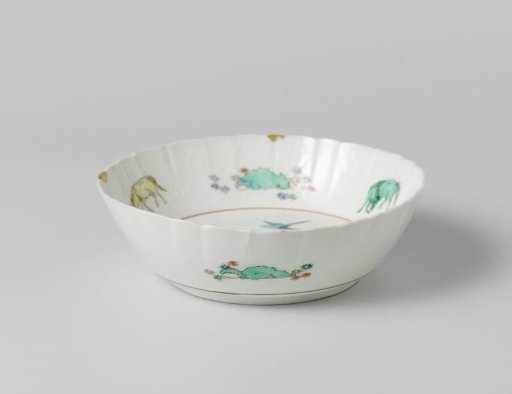 Bowl with floral scrolls in relief, horses and flowering plants