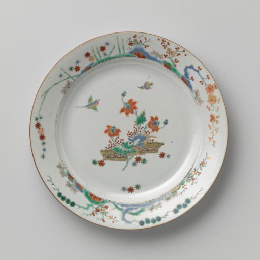 Plate with flowering plants and birds
