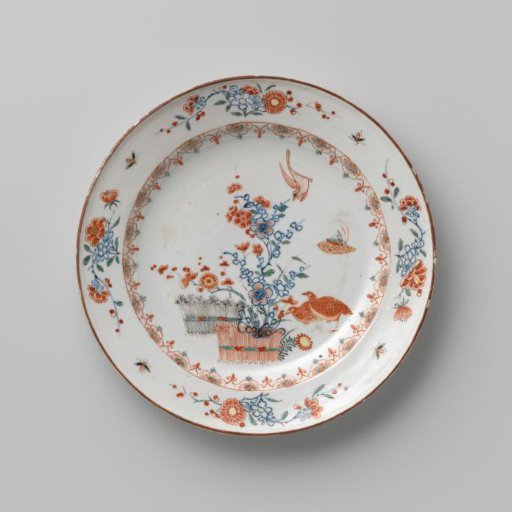 Plate with quails and a bird near a prunus