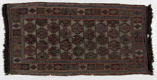 Carpet with an infinite repeat of staggered rows of connected guls, border with a checkerboard pattern