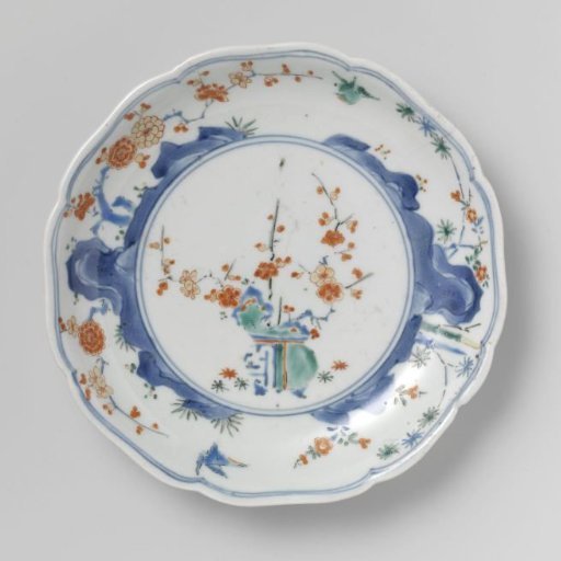 Scalloped dish with flowerpot, rocks, birds, bamboo and prunus