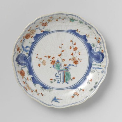 Scalloped dish with flowerpot, rocks, birds, bamboo and prunus