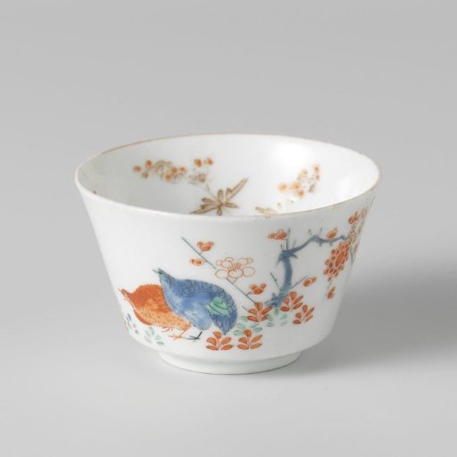 Cup with quails, prunus and flowering plants