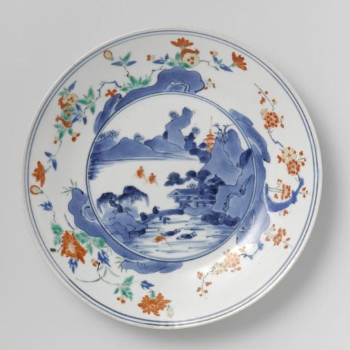 Plate with a water landscape and flowering plants