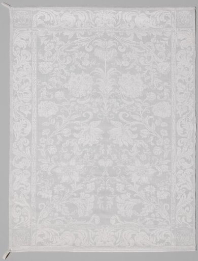 Napkin with pattern of branches with crown imperial (fritillaria imperialis) and with woven monogram in the corners