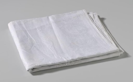 Table runner of white linen damask with coat of arms of the Wheble family and motto LABORE ET INDUSTRIA