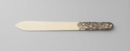 Letter opener of ivory with a silver, partially gilded handle