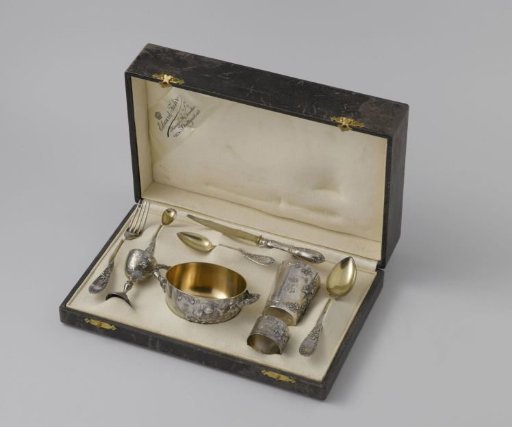 Children's silver service, partially gilded, with accompanying cutlery, together in a case