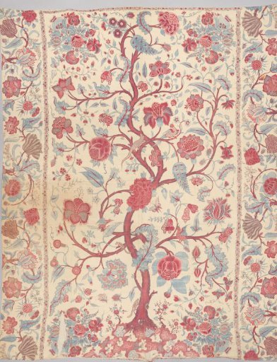 Sitsen spread with a white ground, a large serpentine tree trunk, and medium-sized flowers