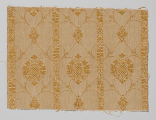Fragment of upholstery fabric with a pattern of grapevines between vertical stripes. Yellow weft on natural-colored warp