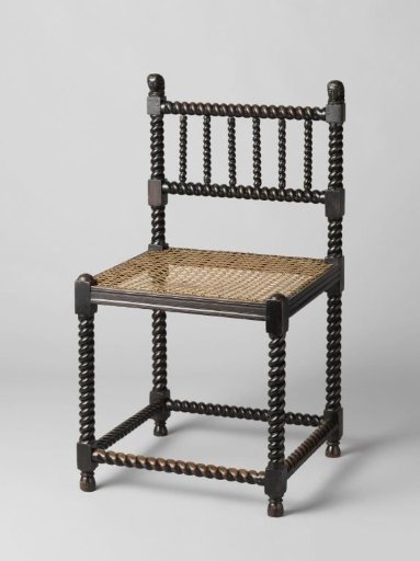 Chair with Splayed Legs, Back Splats Crowned by Carved Heads