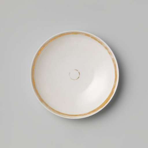 Saucer with a medallion and gold border