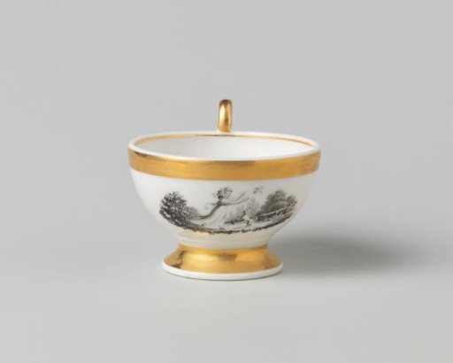 Cup with different figures in a landscape