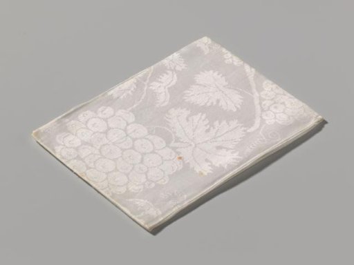 Napkin with grapevines and the arms of Nassau, Schagen, Hornes and Ghiennes. Marked AVB 13.