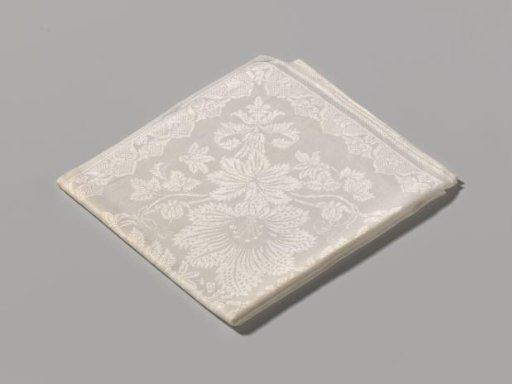 Napkin with floral pattern, marked FS 18.