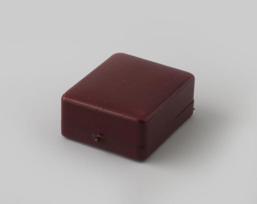 Square jewel box covered with red