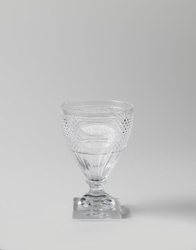Chalice glass on a square foot with two medallions with inscriptions