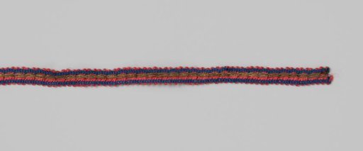 Band of red silk thread decorated with chain stitch in blue silk and gold thread