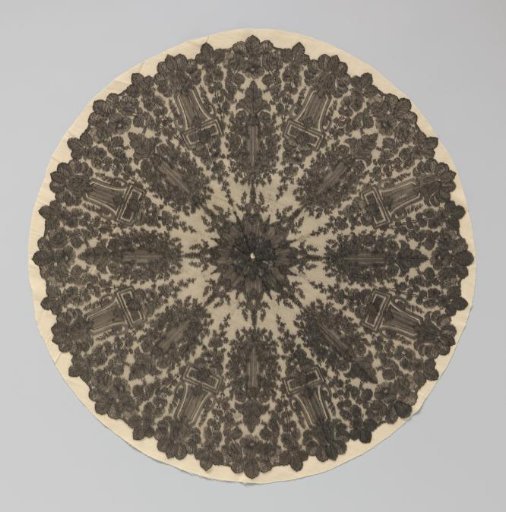Parasol top of black bobbin lace with floral garlands and consoles