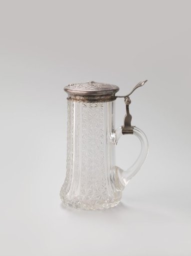 Crystal jug with silver lid, decorated with stems, leaves and two seed buds.