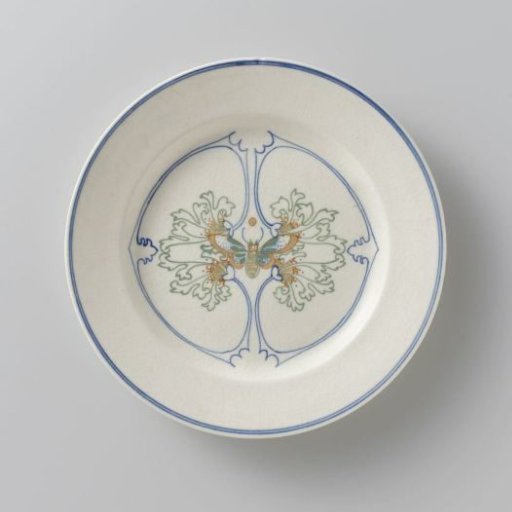 Earthenware plate with a butterfly decoration