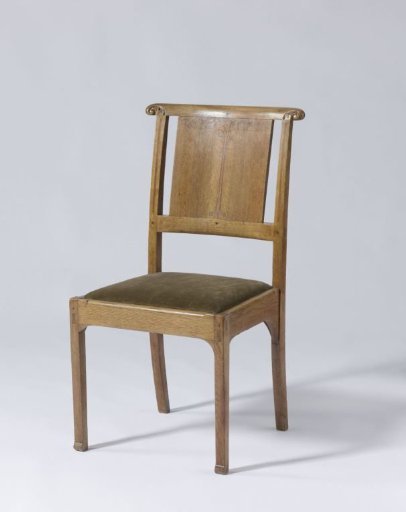 Chair with ivy decoration in the back panel